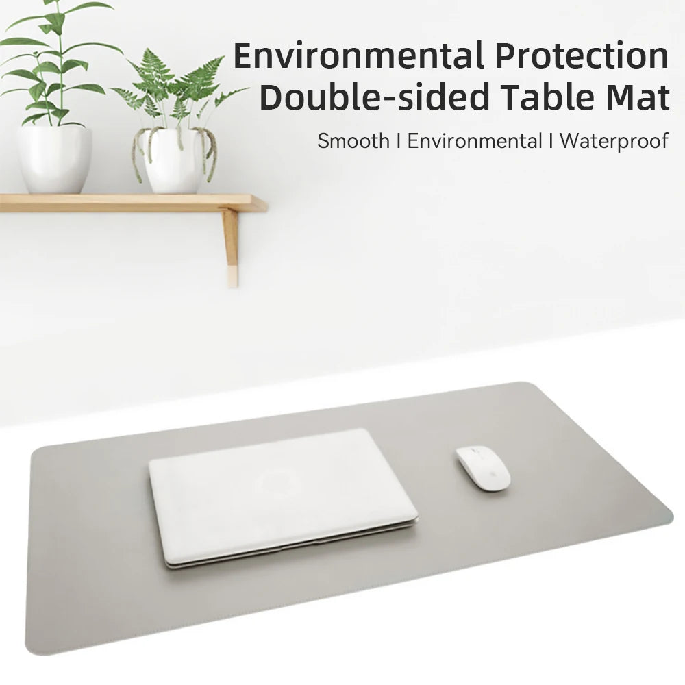 Elevate your workspace with our Large Desk Protector Mat! Waterproof PU leather doubles as a mouse pad, keyboard desk pad, and gaming surface.